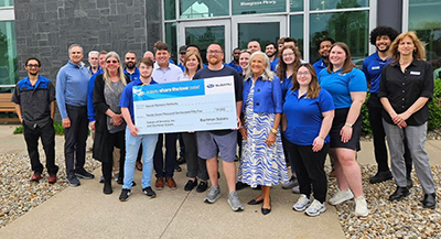 Check presentation at Bachman Subaru including many people from Bachman Subaru and several Special Olympics Kentucky athletes and representatives.
