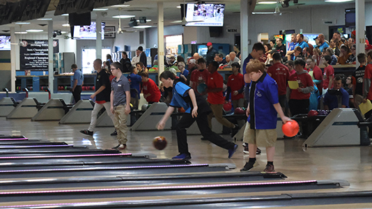 Several bowlers on the approach at the 2024 State Bowling Tournament