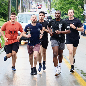 Police running with the Special Olympics Torch