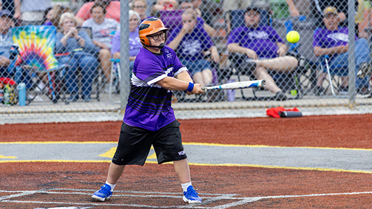 Batter hitting a ball